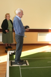 Robdert Adams, from Immanuel parish, takes part in the bowls during his visit to Glenavy Open Door Club.